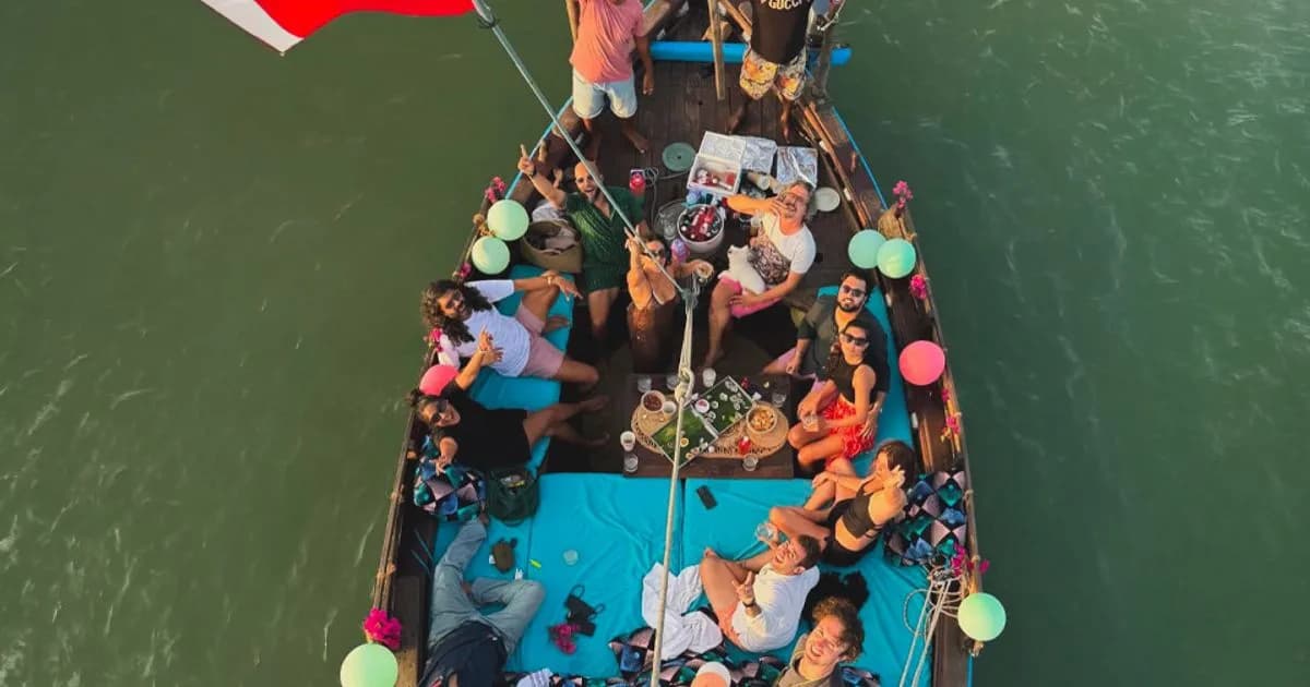 A Swahili dhow at anchor on the creek at sunset