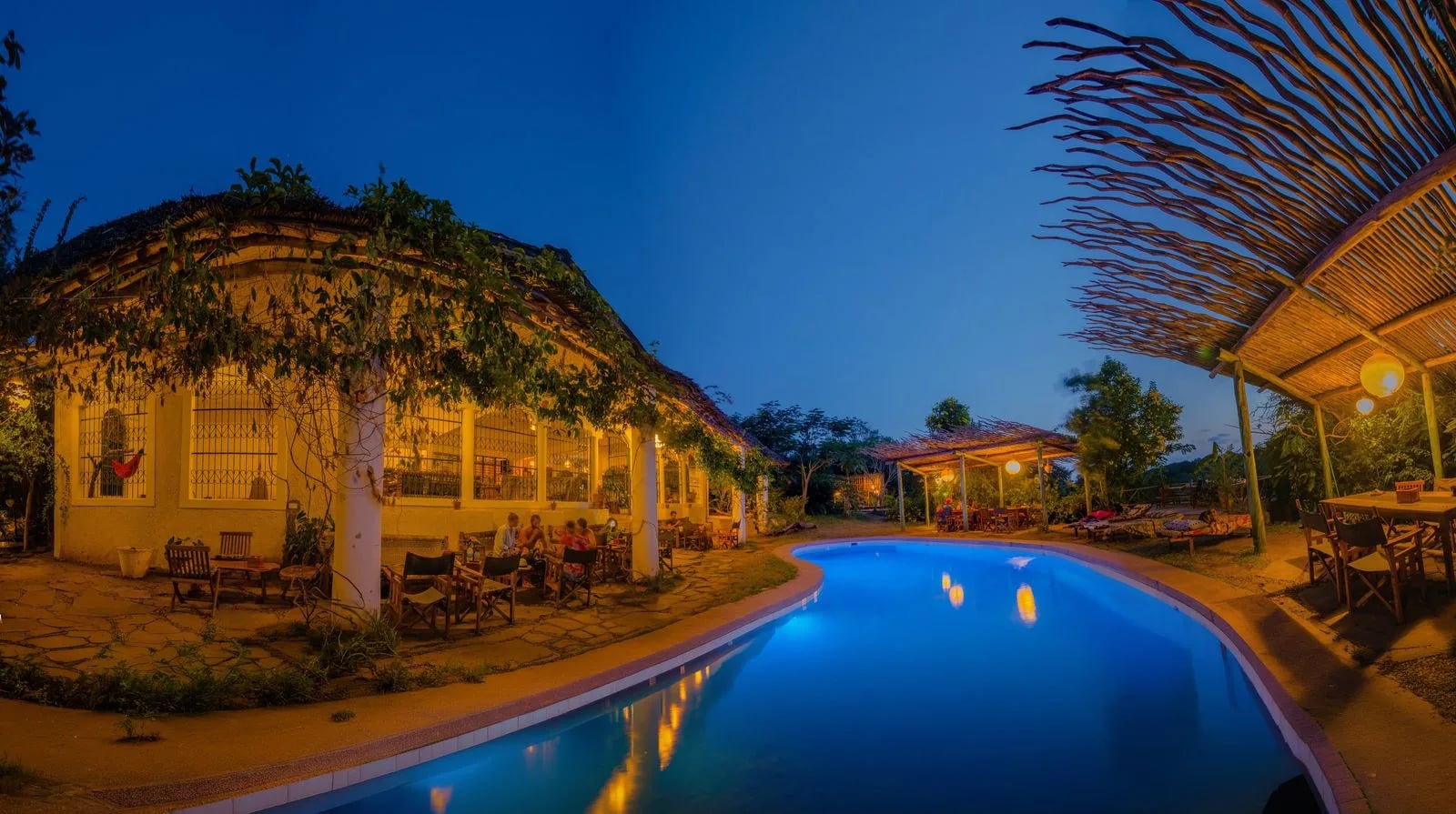 Sun-soaked pool deck overlooking the Kilifi creek at golden hour